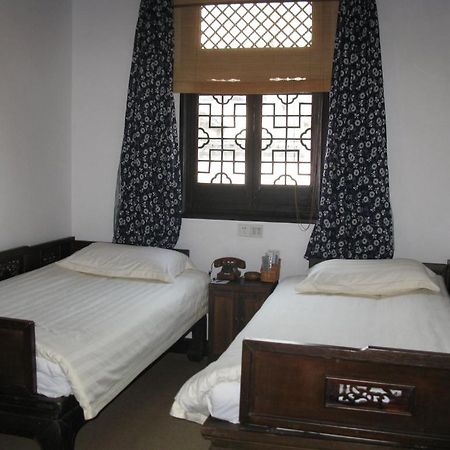 XI Di Travel Lodge Yi (Anhui) Quarto foto